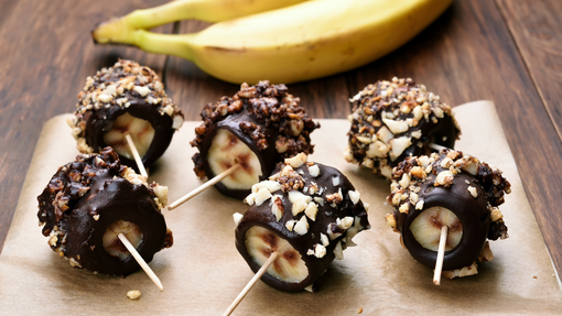 Banana pieces coated in hardened chocolate