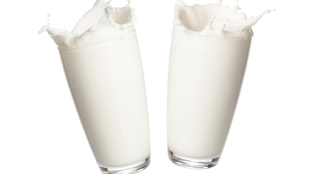 Two glasses full of milk