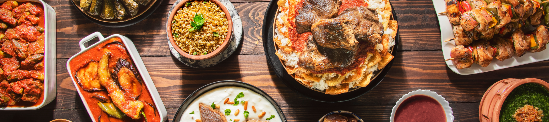 A colourful spread of a variety of food dishes.